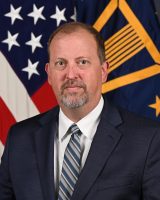 Mr. William Dunlap poses for his official portrait in the Army portrait studio at the Pentagon in Arlington, Va. July 20, 2023.  (U.S. Army photo by William Pratt)